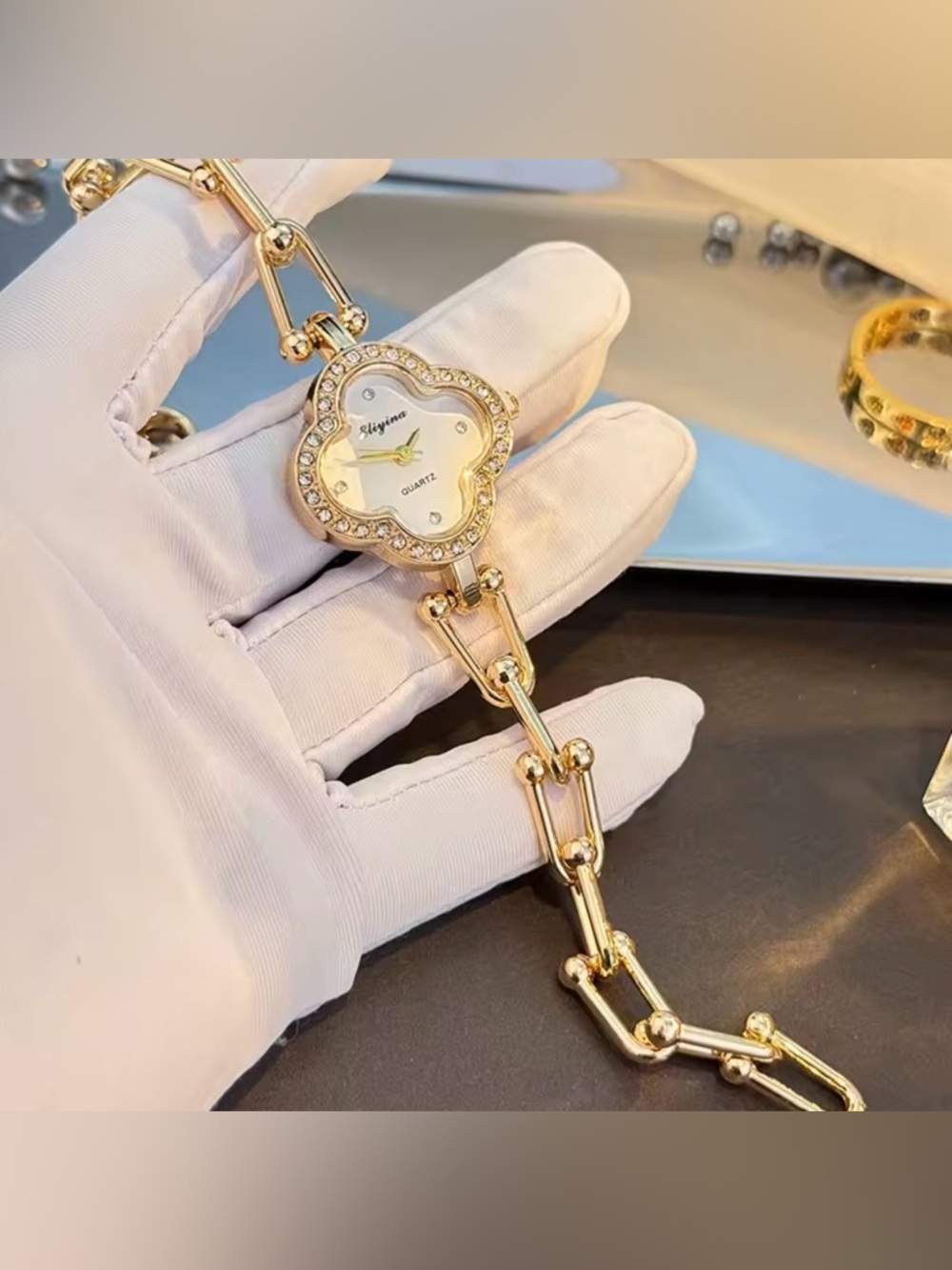 Nordstrom Gold-Tone Clover Bracelet Watch with White Dial
